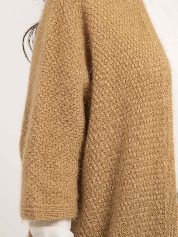 Gilet mi-long ouvert...