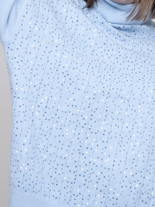 Pull col roulé à sequins...